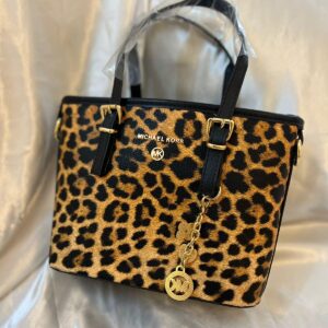 مايكل كورس تايجر قاعدة