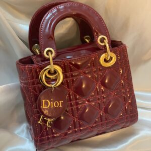 حقيبة ليدي ديور لون برغندي حجم صغير
