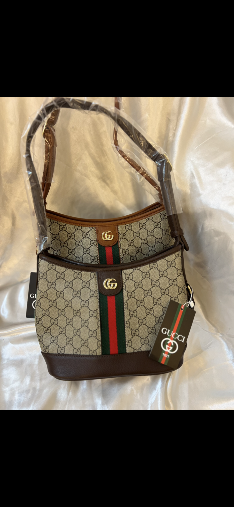 حقيبة جوتشي مع يد طويلة